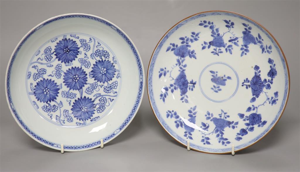 Two Chinese Kangxi blue and white dishes, one with Batavia cafe-au-lait glaze to the underside, diameter 22cm